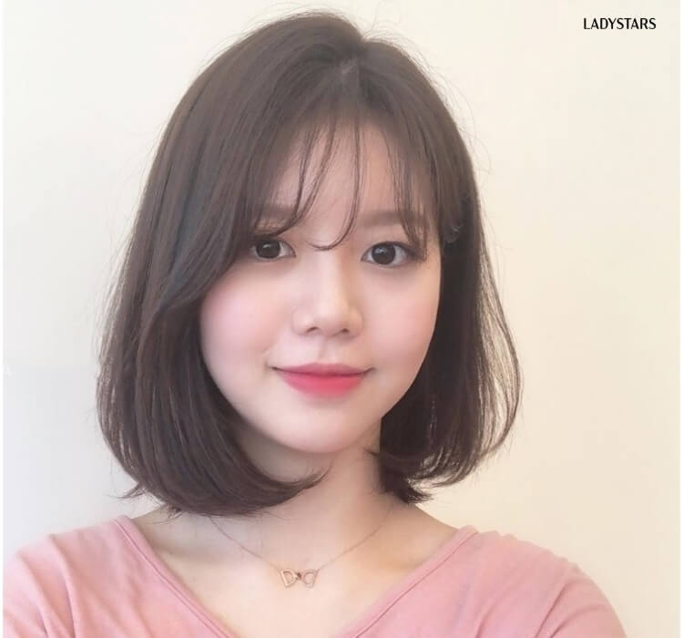 Tóc ngang vai uốn cụp